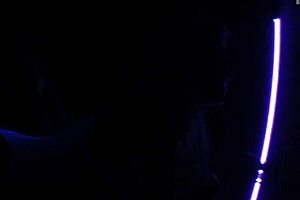 carrie b engages in blacklight sex showcasing small tits and fetish desires