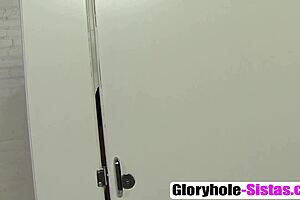 Ebony babe Mia Austin gives a glory hole blowjob in this casual interracial scene.