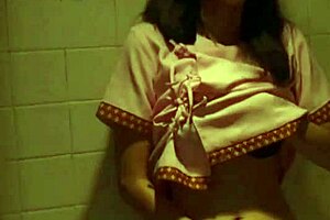Aum Lakkana in a steamy solo fingering scene.