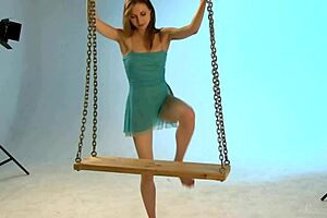 hot teen 18+ model strips naked on swing