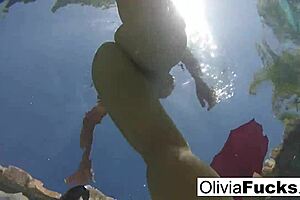 i'm olivia, having some steamy solo fun in the pool with my tits and pussy out