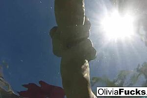 i'm olivia, having some steamy solo fun in the pool with my tits and pussy out