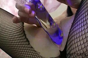 Horny brunette squirts hard with dildo play