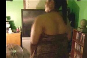 april rains popping her ass in gold and black fit with music and dancing