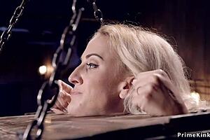 Blonde endures bondage restraint