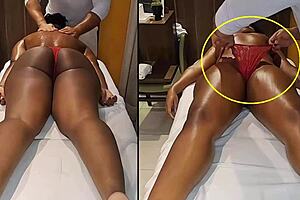 Therapist removes client's panties during tantric massage session