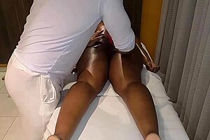 Therapist removes client's panties during tantric massage session