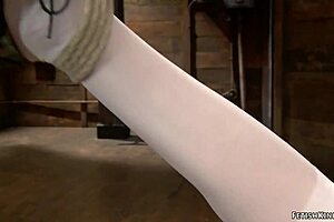 redhead lesbian gets caned while hogtied and gagged