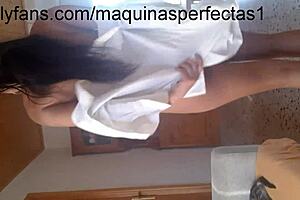 Beautiful colombian woman trying on lingerie and dancing