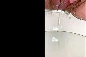 pee diary of a young 18+ girl. hairy pussy splashing piss on white thighs.