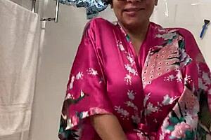 Anna, mature Latina, dancing sexy in her robe.