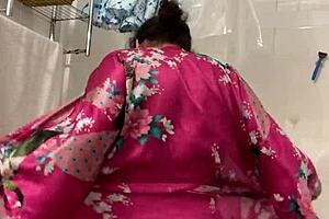 Anna, mature Latina, dancing sexy in her robe.