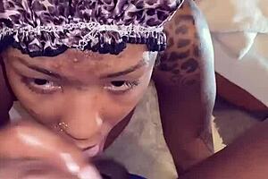 Ebony Babe Gets Facial from Big Black Cock.