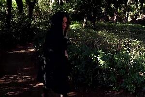 Why is she getting naked outdoors in barcelona's public park?