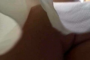 Lady in white dress reveals upskirt outdoors