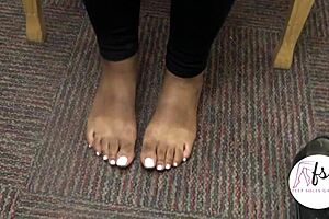 Discover hidden candid shots of Ethiopian college student's ebony feet and toes.