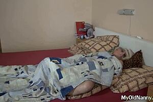 Lesbian assists elderly woman with self-pleasure