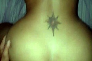 Blonde mature woman is bent over in a doggystyle position