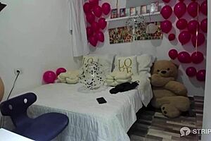 this colombian camgirl's got big tits and she's fingering her shaved pussy