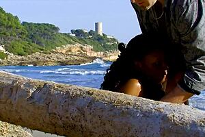 white cock slides into black pussy at a steamy beach encounter