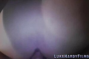 Watch busty brunette sucking Luke Hardy's cock.