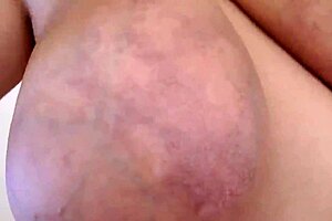 alice 85jj shows off massive boobs in sexy strip tease