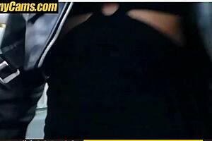 brunette webcam girl in black leather biker jacket