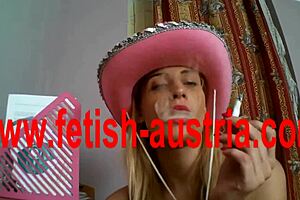 Feel the humiliation as Kimberly Pink teases in nylons and heels, smoking seductively.