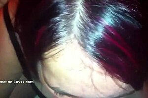 A milf with very beautiful chest and red hair above her head performs very well during oral sex