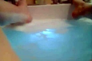 A hot shower scene featuring bathing and relaxation in a steamy environment