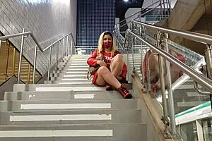 Blonde teases pussy in public