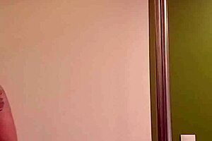 dana barzagli moves seductively, showing her curves.