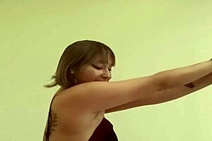 dana barzagli moves seductively, showing her curves.