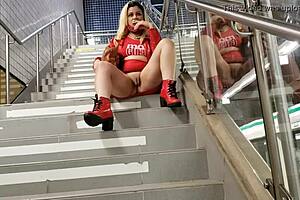 Blonde teases pussy in public