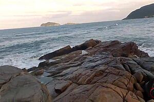 The paragliding instructor caught him drilling her ass on Magic Island.