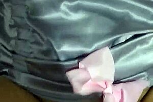 skirtshouse showcases silver satin skirt in casual display.