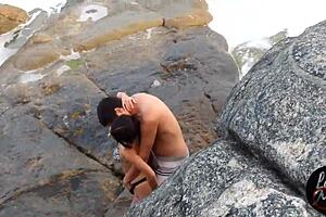 The paragliding instructor caught him drilling her ass on Magic Island.