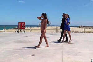 Bare Spanish slave endures public walking in bondage humiliation