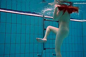 Hey, check out this underwater mermaid vesta as a horny teen 18+ splashing in the pool and beach with her bikini on, getting all wet in the shower too