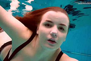 Hey, check out this underwater mermaid vesta as a horny teen 18+ splashing in the pool and beach with her bikini on, getting all wet in the shower too