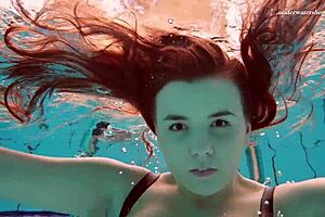 Hey, check out this underwater mermaid vesta as a horny teen 18+ splashing in the pool and beach with her bikini on, getting all wet in the shower too