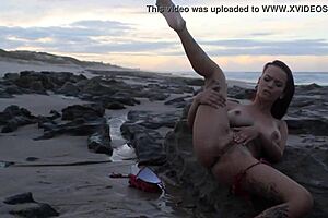 Two teens cumming hard on the beach during a sensual massage