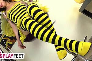 Sexy Bee In Cosplay Strips Off Heels And Striped Stockings For Foot Fetish