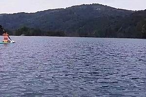 pissing on my sup at the mountain lake in panties 😏