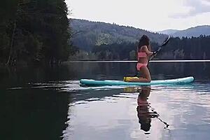pissing on my sup at the mountain lake in panties 😏