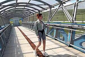 Risky public sex slams tight pussy on pedestrian bridge
