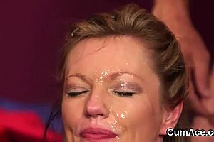 This unusual hottie is getting cum shot on her face and gulping it all
