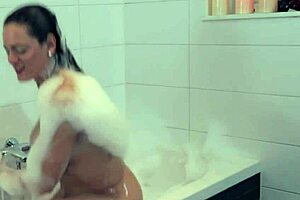 Solo Bathing Shemale Tugs Her Hard Shaft