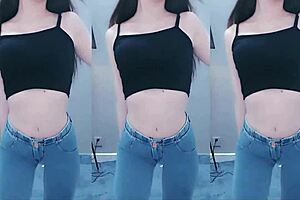 Sensual dance of Asian beauty with vibrator on webcam