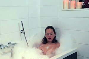 Solo Bathing Shemale Tugs Her Hard Shaft